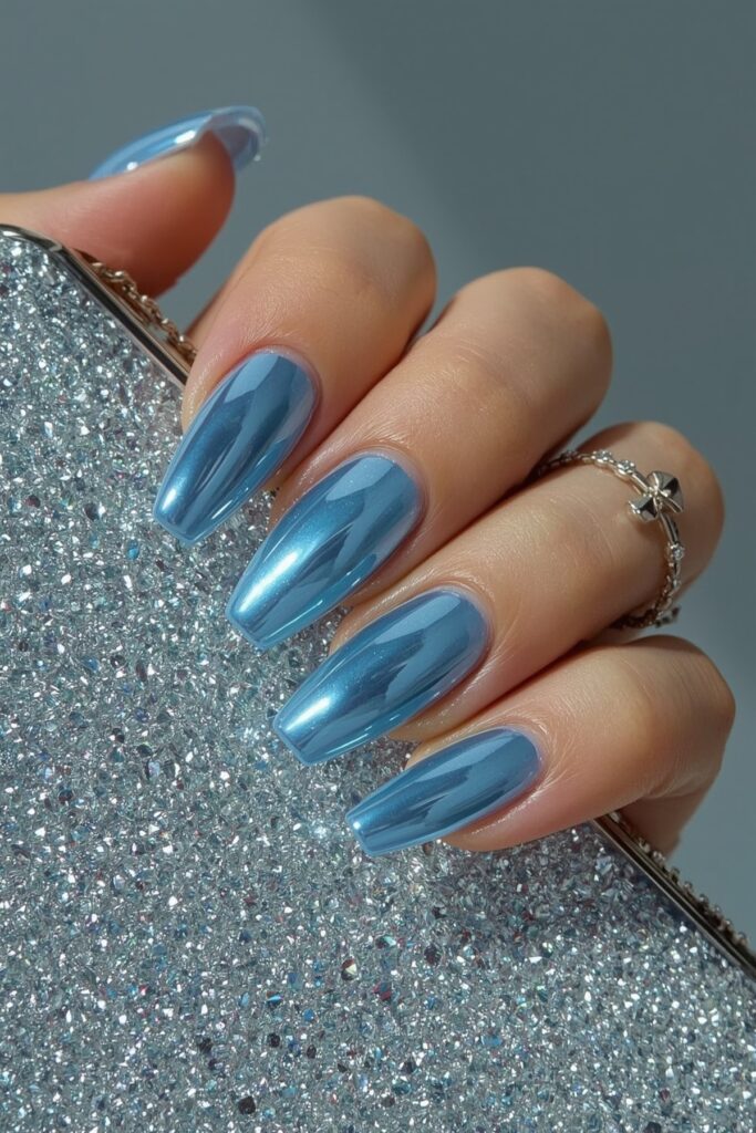 Ice Blue Chrome Almond Nails